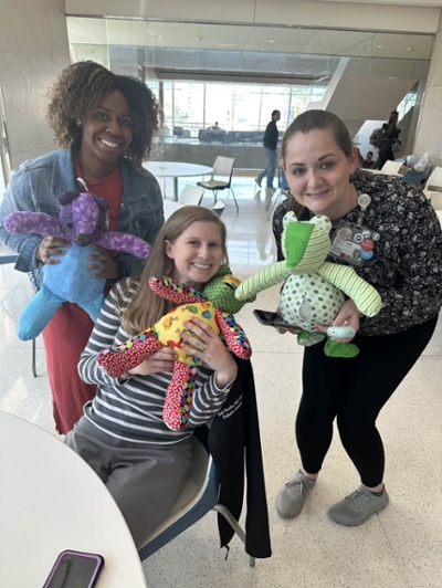 Genetic Counselors holding Rare Bears on Rare Disease Day 2024